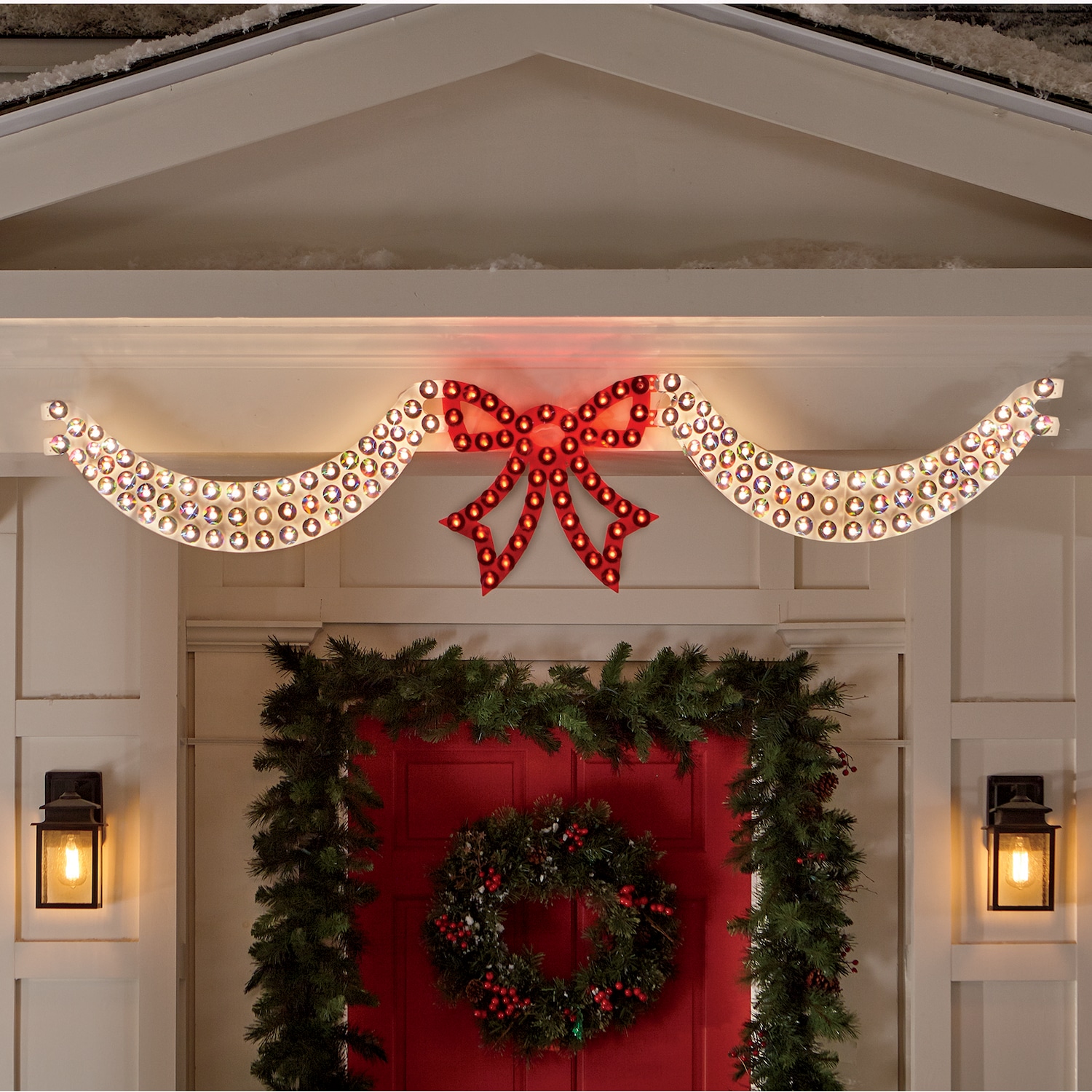 Lighted Clear Swags And Red Bow Outdoor Christmas Window
